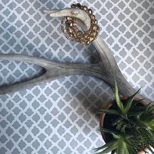 Gold and amber multi string bracelet